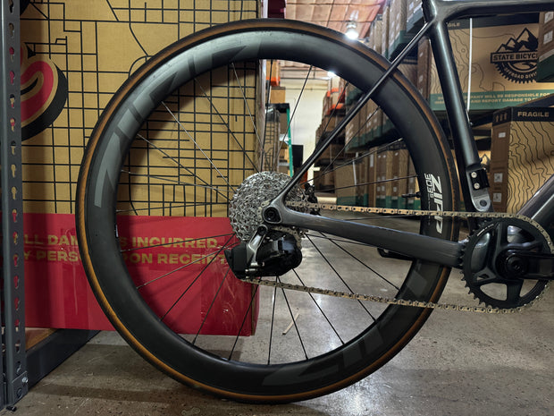 #1276 - Undefeated Road Carbon | Graphite (Size 48cm, Used Condition – Team Rider Bike)
